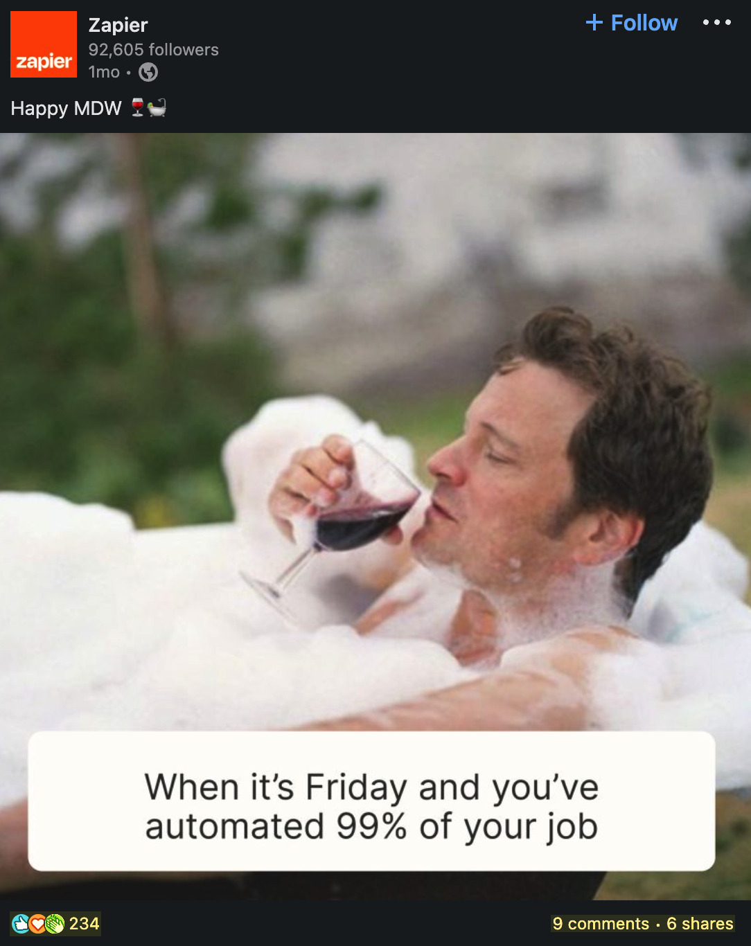 Man celebrating Friday by sipping wine from a wine glass while sitting in a bathtub 