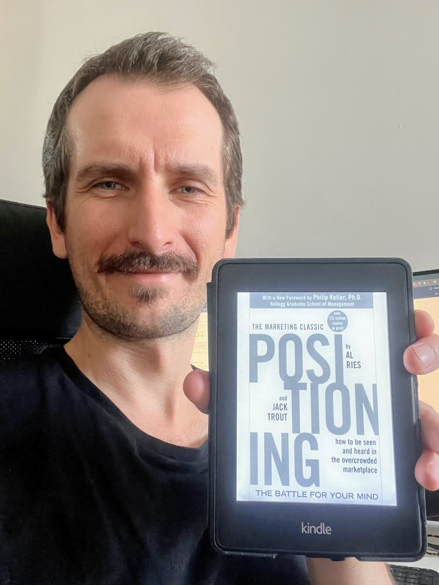 mateusz-holding-the-book-positioning I Asked 26 Marketers for Their Best Marketing Books. Here's What They Recommend