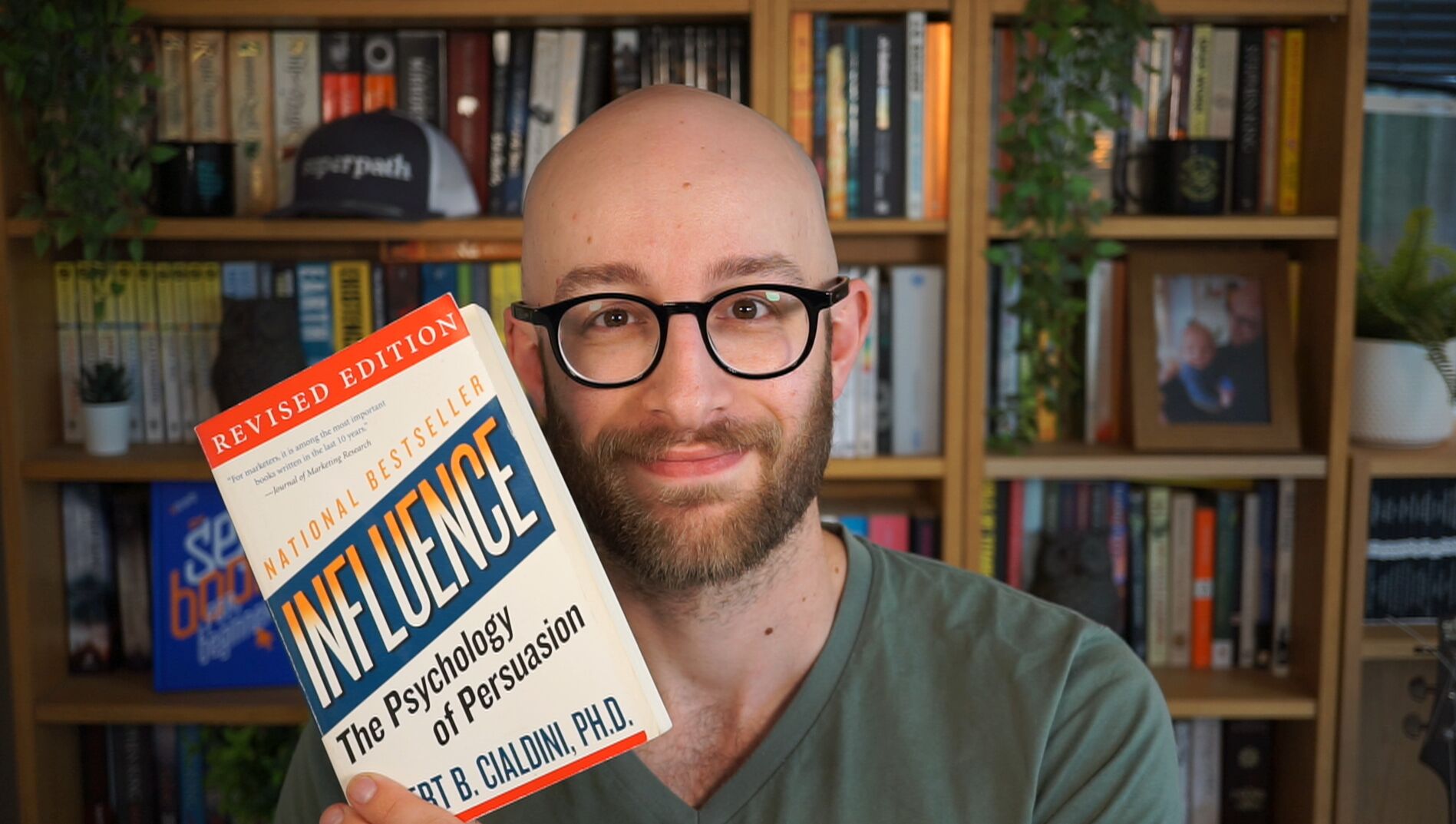 ryan-law-holding-the-book-influence I Asked 26 Marketers for Their Best Marketing Books. Here's What They Recommend