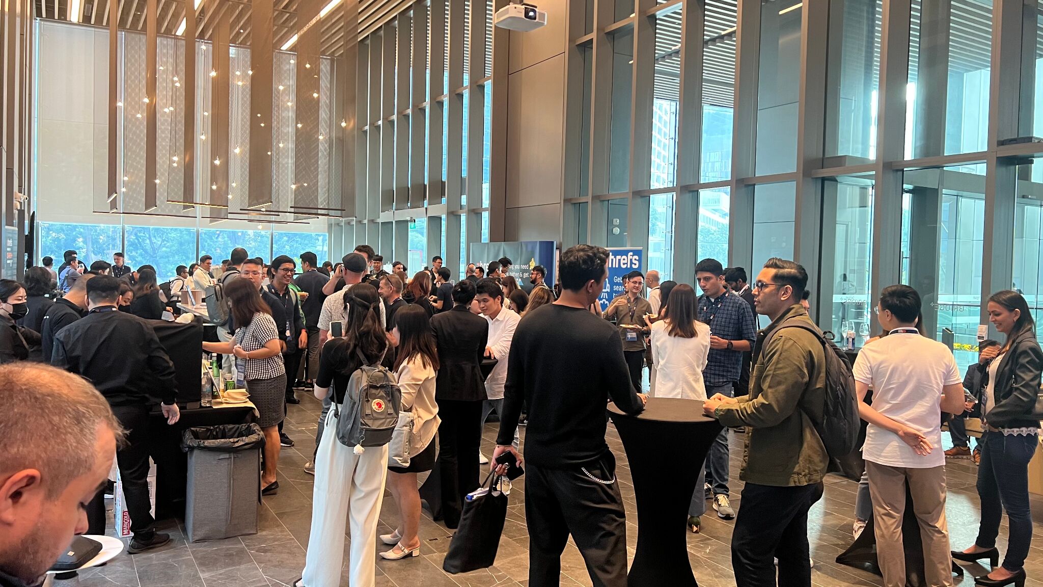 people-networking-at-sg-seo-summit-2023 Event Marketing: The Ultimate Guide That Cost $400k to Make