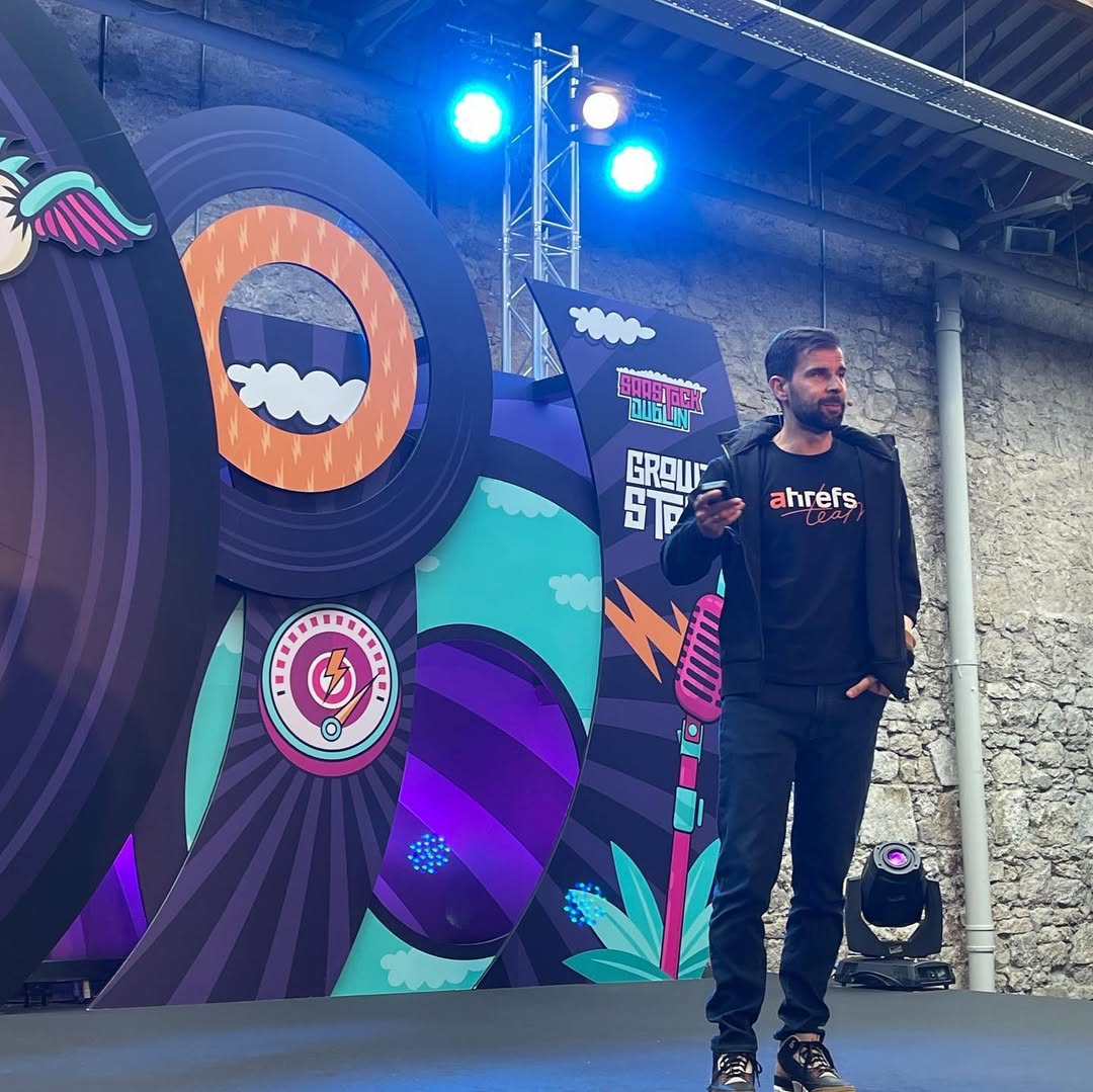 photo-of-our-cmo-tim-soulo-speaking-at-saastock-du Event Marketing: The Ultimate Guide That Cost $400k to Make